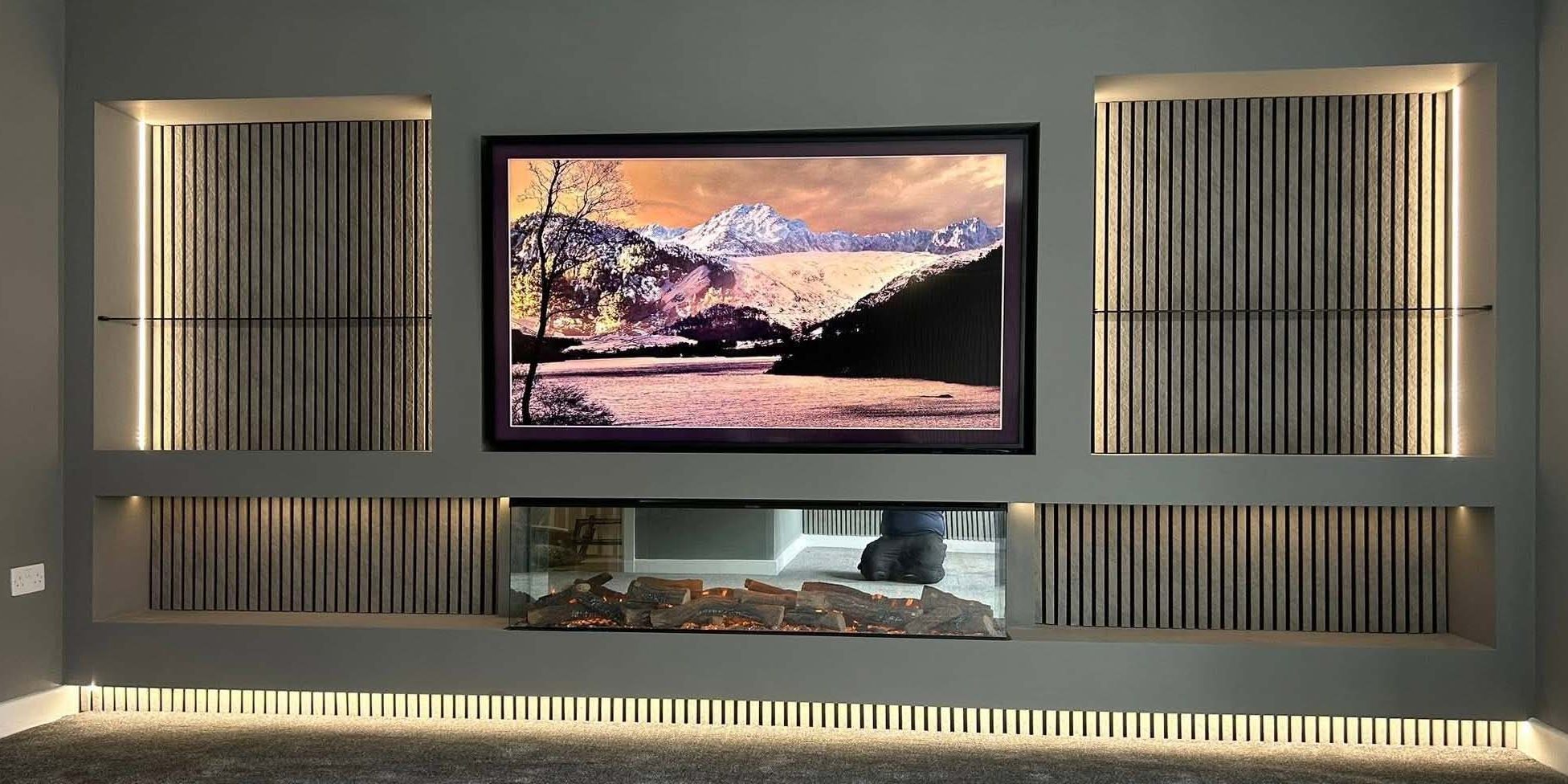 Large Media Wall with panelling and down lights